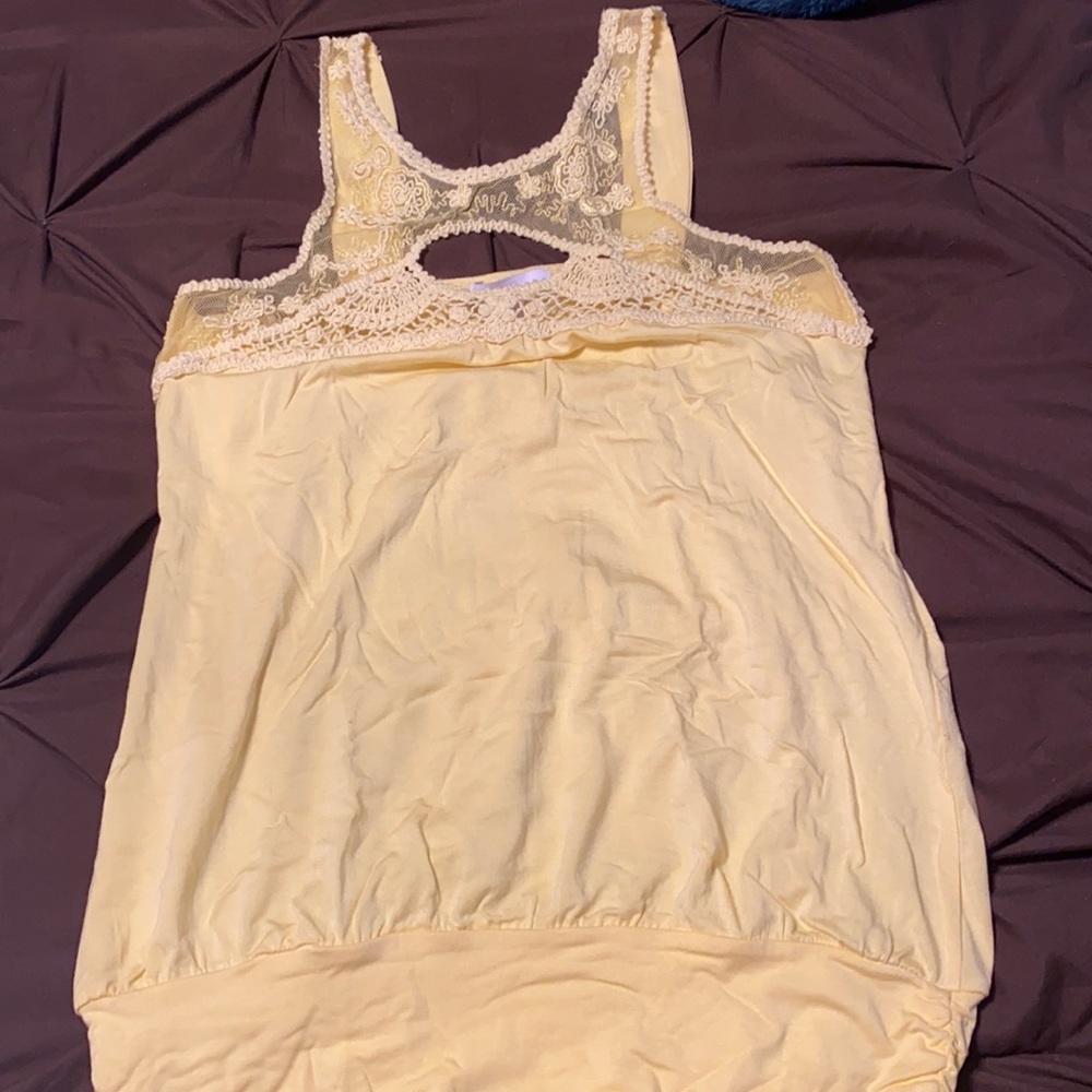 Yellow sleeveless top